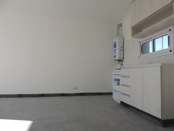 VENTA - DEPARTAMENTO 2 AMBIENTES C/COCHERA - ZONA CENTRICA