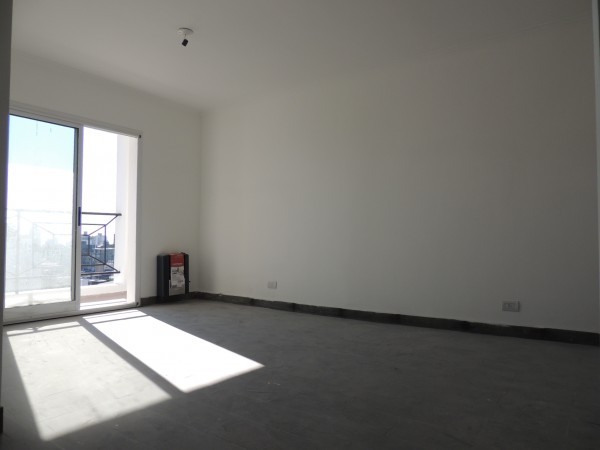 VENTA - DEPARTAMENTO 2 AMBIENTES C/COCHERA - ZONA CENTRICA