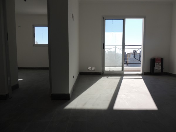 VENTA - DEPARTAMENTO 2 AMBIENTES C/COCHERA - ZONA CENTRICA